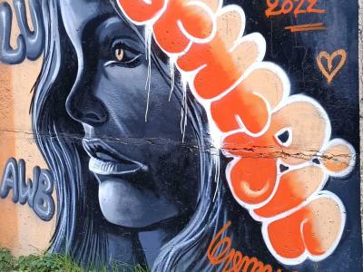 Elegant Orange Floral Portrait — Street art in Berlin