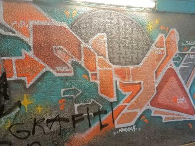 Orange Wildstyle Piece in a Tunnel — Street art in Prague