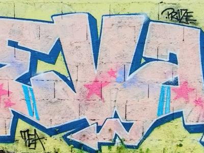 Blue and White Graffiti — Street art in Saint-Paul