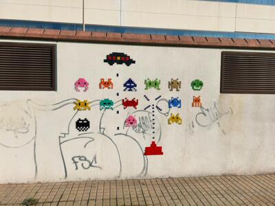 The Space Invaders Wall — Street art by Astro Boy in Beniarbeig