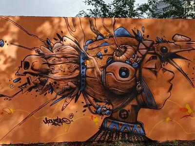 Profile with Bird Heads — Street art by Moon in Nantes