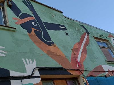 Large Black Bird and Abstract Hands — Street art in Rīga