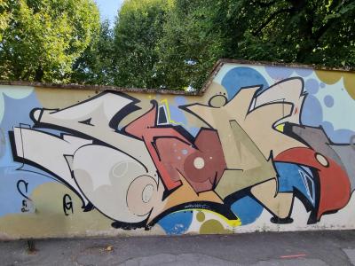 Cream and Red Lettering — Street art in Strasbourg