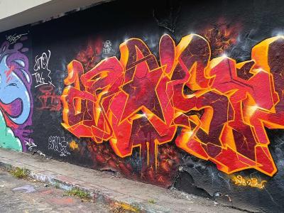Orange Fire Lettering — Street art in Prague