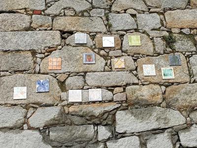 Ceramic Tiles in Stone Wall — Street art in Porto