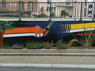 Orange Snakes on Dark Background — Street art in Villejuif