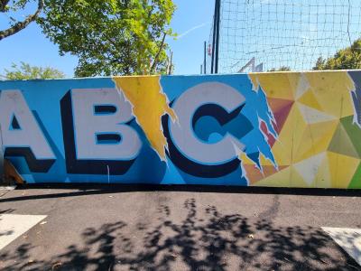 ABC in the Torn Wall — Street art in Vallon-Pont-d'Arc