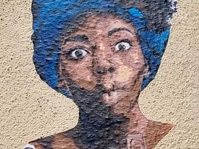 Surprised Face with Blue Hair — Street art by SoRi in Clermont-Ferrand