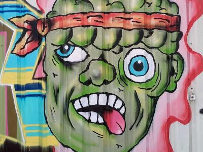 Green Zombie with Red Headband — Street art in Rennes