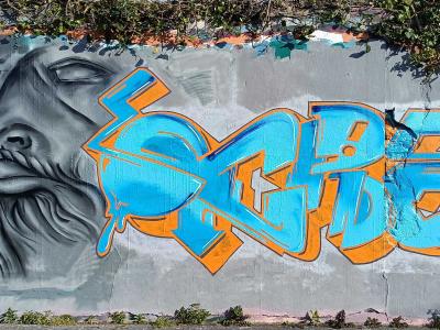 Cyan and orange lettering — Street art in Nantes