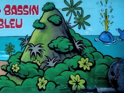 Mountain Creature and Flowers — Street art by Jace in Saint-Denis