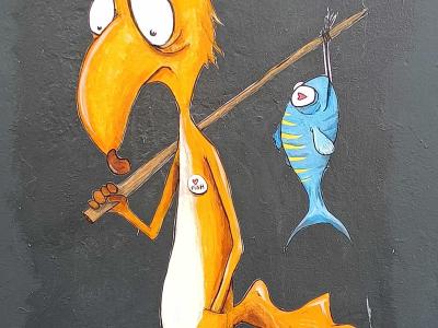 Orange Fishing Creature on Platform — Street art in Nantes