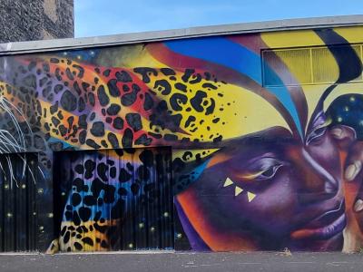 Woman and Leopard Portrait — Street art in Clermont-Ferrand