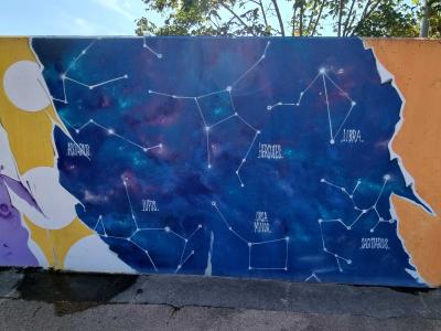 The Star Map in the Torn Wall — Street art in Vallon-Pont-d'Arc