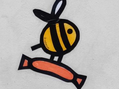 Bee with Sausage by Mister Zion — Street art by Mister Zion in Nantes