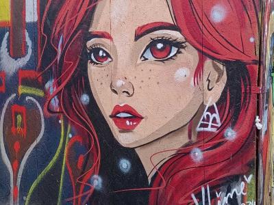 Girl with Red Hair — Street art in Prague