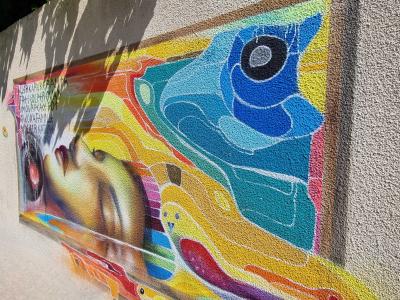 The Sleeper with Headphones — Street art in Clermont-Ferrand