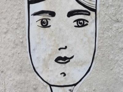 Stylized Crossed Gaze — Street art in Clermont-Ferrand