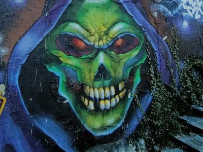 Glowing Green Skull — Street art in Bourges