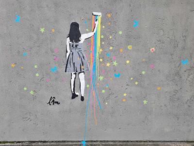 Girl Drawing Black-White with Colorful Stars — Street art in Clermont-Ferrand