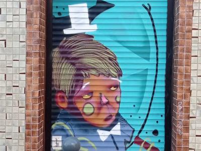 Enfant au chapeau haut-de-forme — Street art à Lille