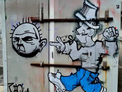 The Walker in a Top Hat — Street art in Grenoble