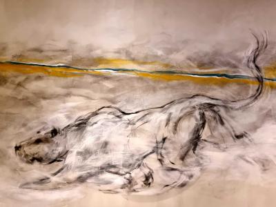The reclining dog in charcoal — Street art in Vallon-Pont-d'Arc