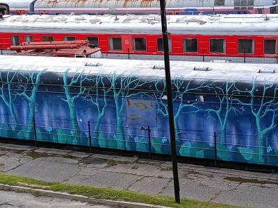 Train Car with Blue Trees — Street art in Vilnius