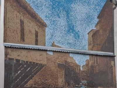Reproduction pointilliste d'une rue ancienne — Street art à Aulnat