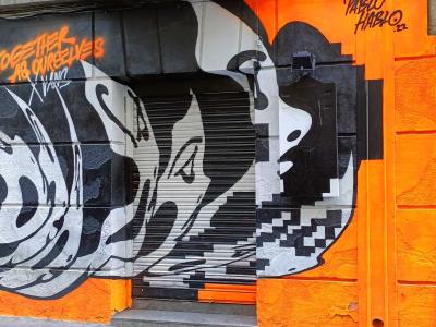 Together as Ourselves Black and Orange Graffiti — Street art in Madrid