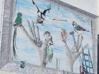 Birds on a Giant Hand — Street art in Nantua