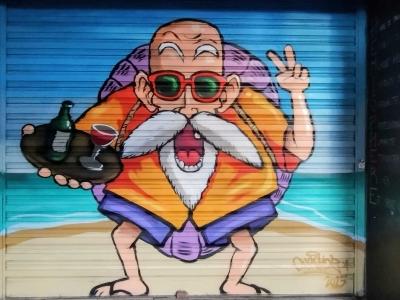 Funny Character with Grenade — Street art in Saint-Paul