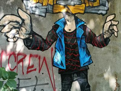 Character with Cassette Player Head — Street art in Nantes