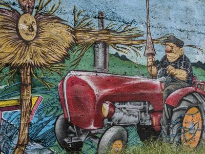 The farmer and his red tractor — Street art in Soyons