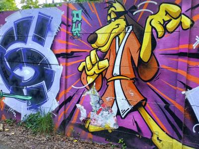 The Dog in a Raincoat — Street art in Nantes