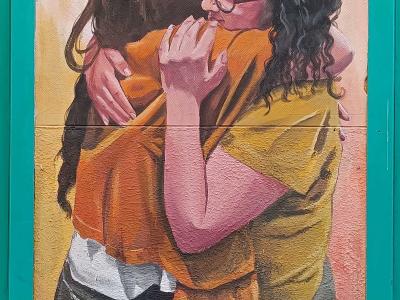 Two Women Embracing Tenderly — Street art in Madrid