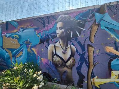 Portrait in the Purple Jungle — Street art in Vallon-Pont-d'Arc