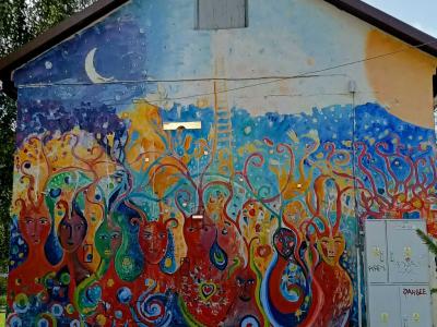 House with night and wavy shapes — Street art by Martynas Šnioka in Vilnius