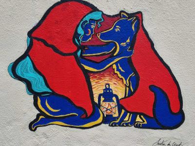 Girl with Wolf and Lantern — Street art in Clermont-Ferrand