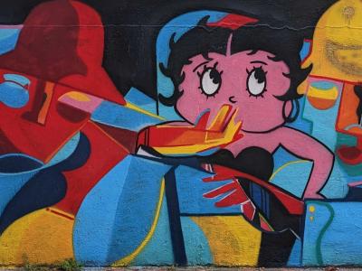 Anime Girl and Colorful Robots — Street art in Valence
