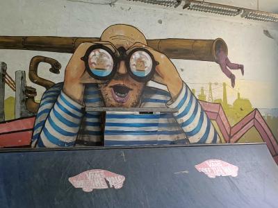 Sailor with Binoculars in a Skatepark — Street art in Rīga