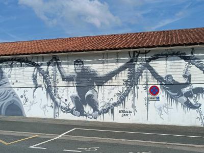 Suspended Monkeys in Black and White — Street art in La Boissière-du-Doré