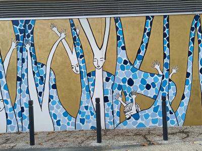 Giraffes with Human Faces — Street art in Angers