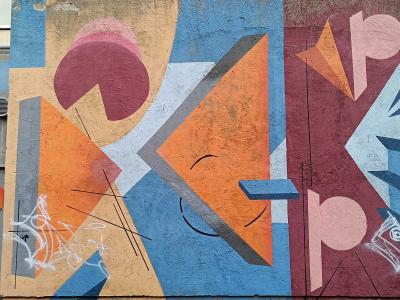 Colorful geometric composition — Street art by Guillaume Herr-Zekanowski (RGNR8) in Vilnius