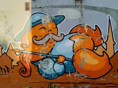 Le fumeur de pipe orange — Street art à Rīga