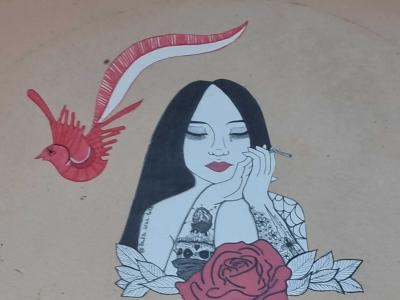 La fille et l'oiseau rouge — Street art à Strasbourg