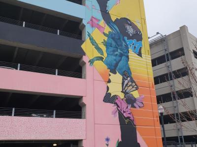 Dynamic Jumping Figure Multicolor Mural — Street art by Marka27 in Boston
