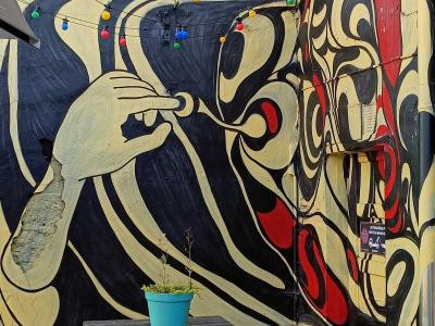 Black and Gold Tribal Figures — Street art in Rīga