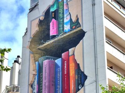 Colorful Books Bursting from Building Mural — Street art by JAN IS DE MAN in Grenoble