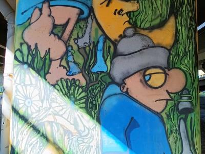 Schtroumpf sorcier et personnage cool — Street art à Rīga